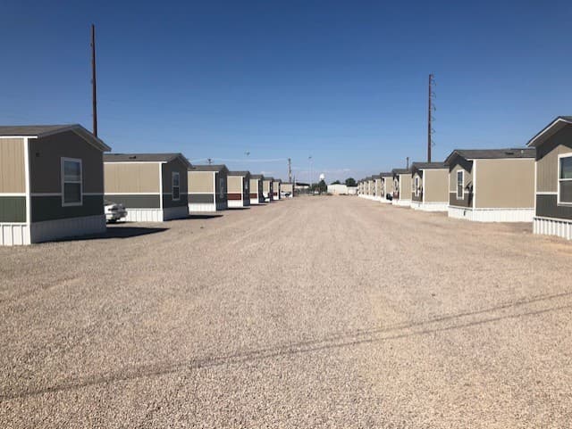 Rows of Iron Guard Lodging workforce housing units at a West Texas camp